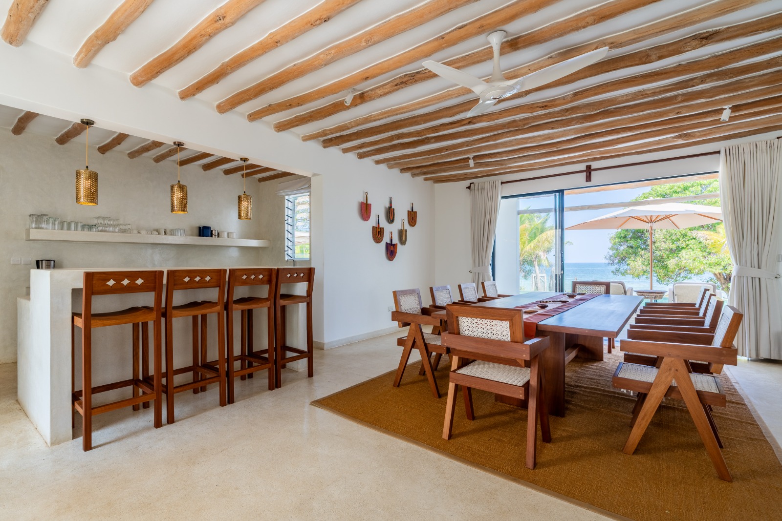 Villa dining room and bar overlooking the ocean