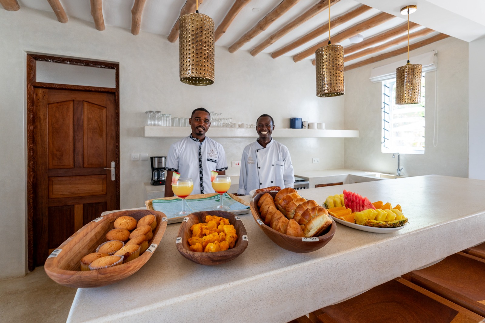 Villa team serving a fresh breakfast